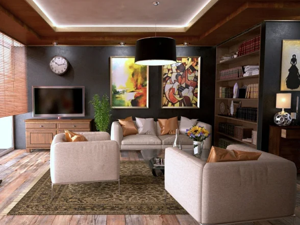 light sofa and arm chairs in a room with dark walls and laminate floors