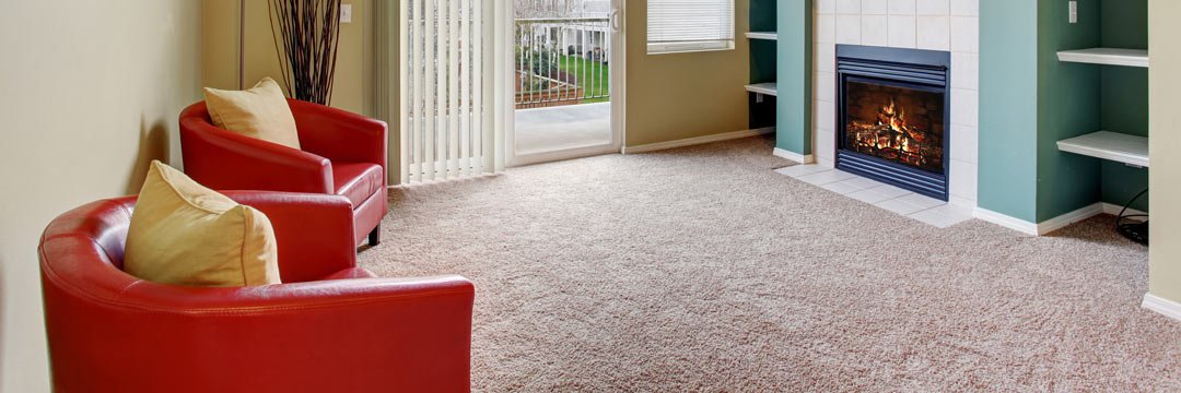 red chairs and light beige carpet floors in spacious room