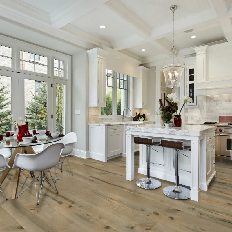 kitchen with white cabinets, high-end appliances and beautiful hardwood floors