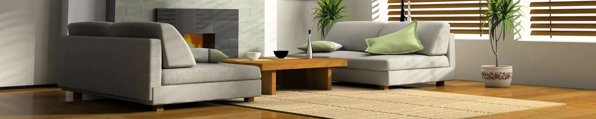 modern fireplace warm up a modern sitting area with grey couches and beautiful hardwood floors