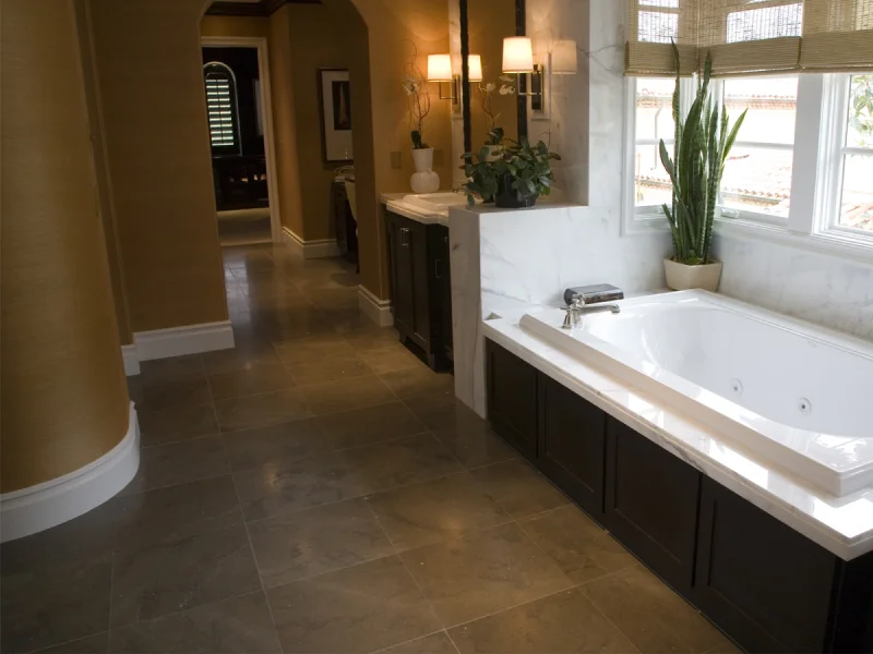 earth tone tile in traditional bathroom