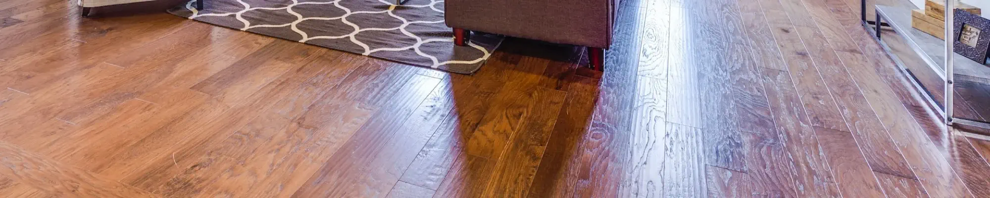 brown sofa besides a metal coffee table